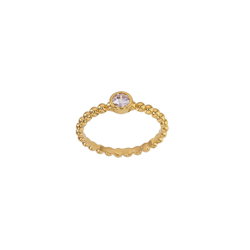 Gold-plated ring with bezel set